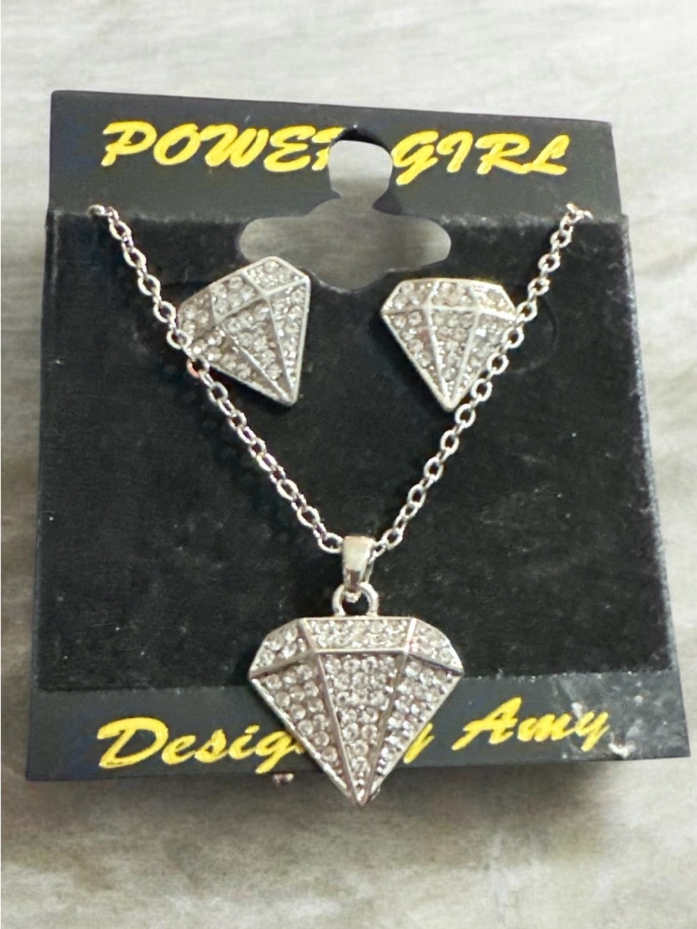 Silver Diamond Pendant Necklace and Earring Set
984